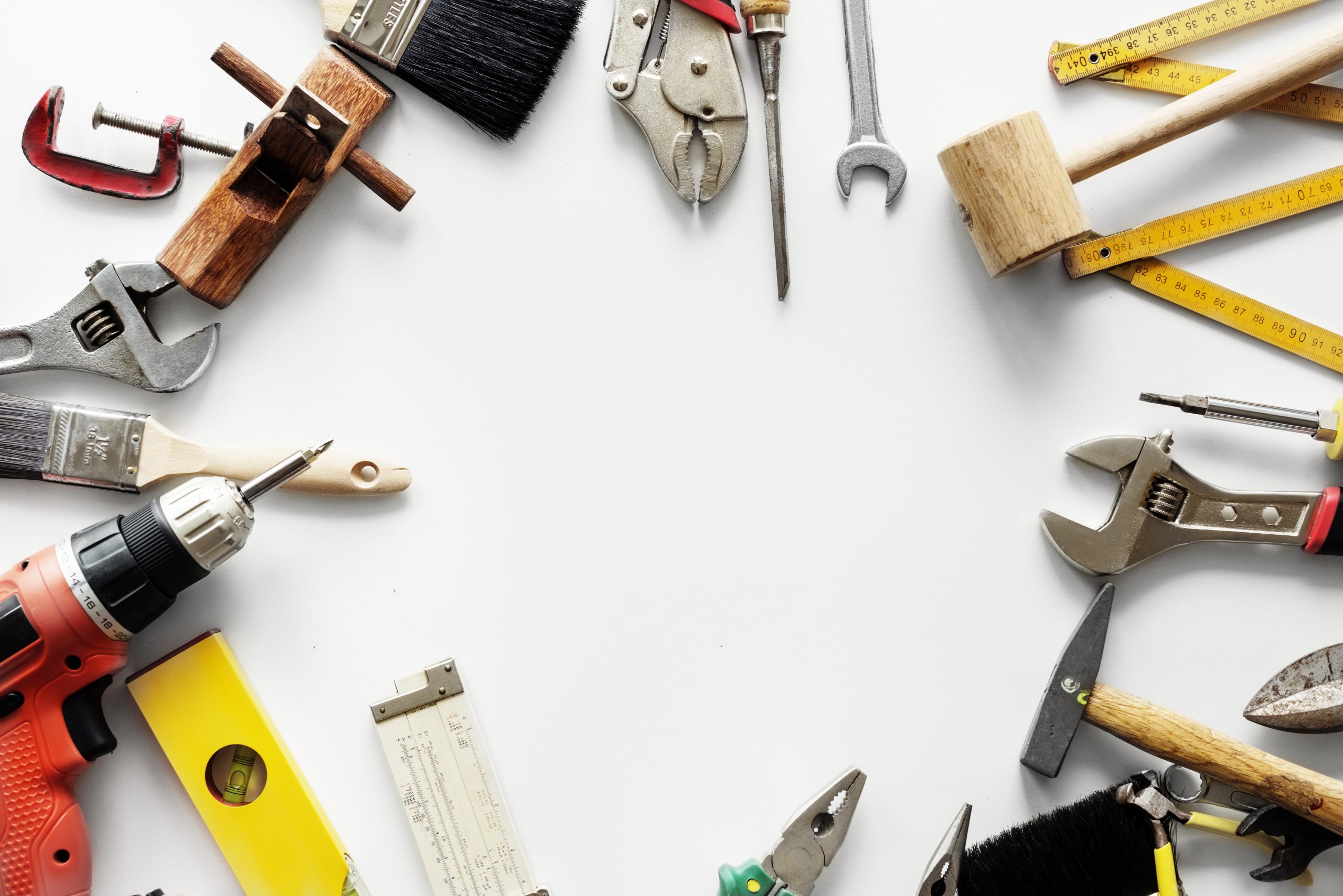 Power Tools flat lay of various technician tools isolated on white backgroun